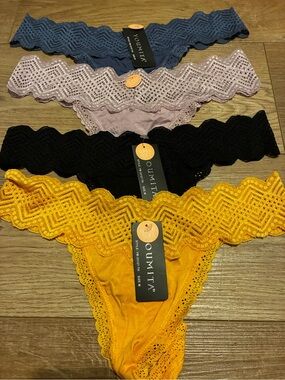 Youmita Lace Cheeky Thong Set in Blue, Lavender, Black, and Yellow
